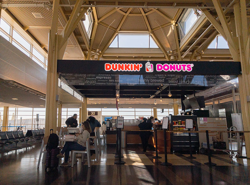 Dunkin' Donuts Stand at Modern Airport